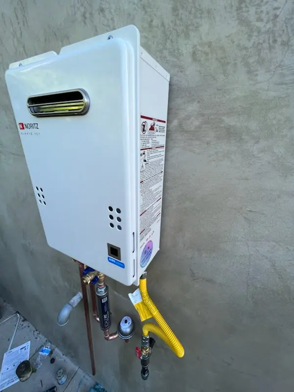 Tankless water heater installation for Collegeville Arms homes
